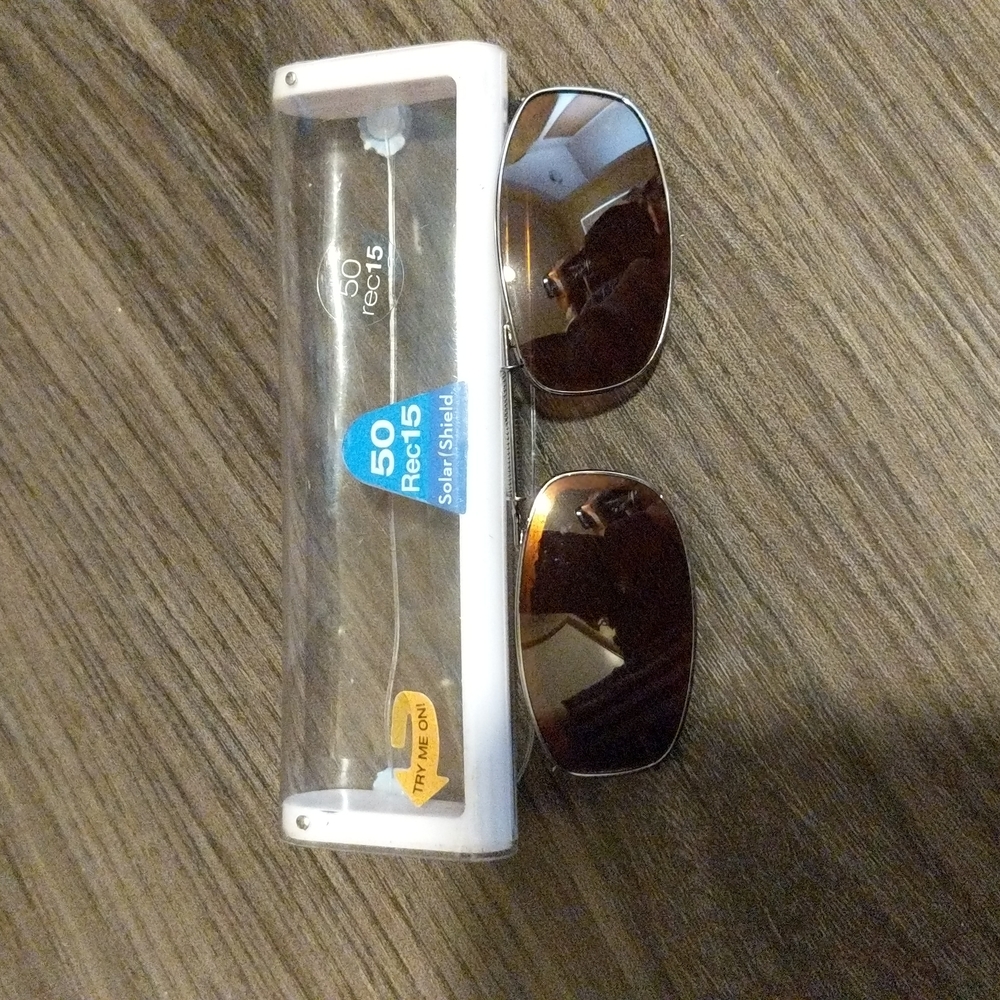 Brown lense clip on sunglasses by Solar Shield
